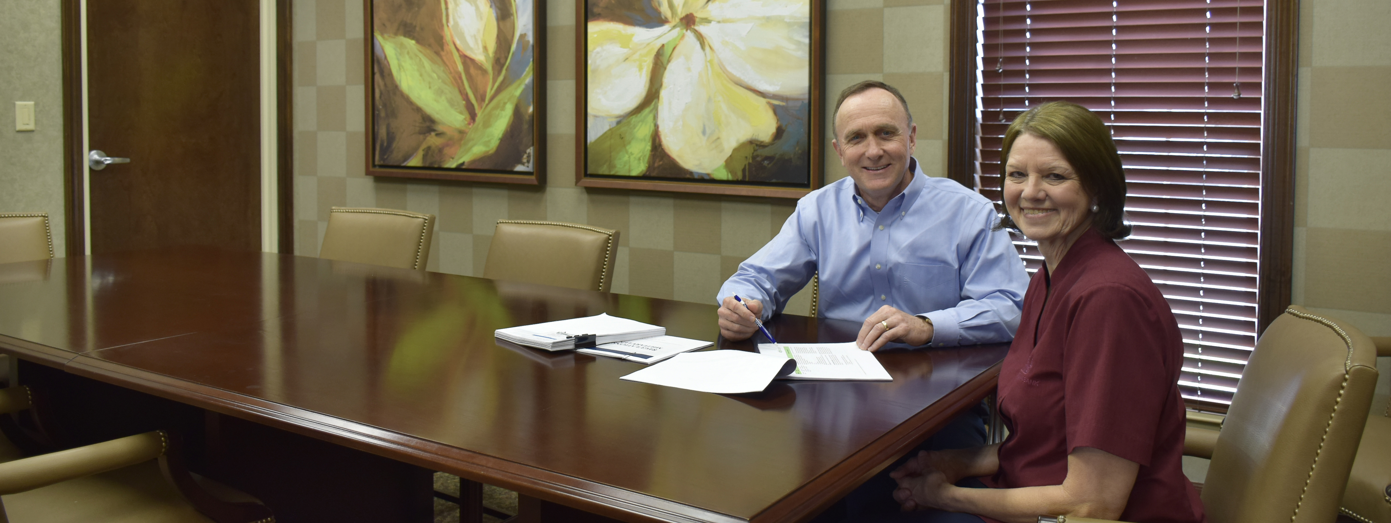 Lake Charles employees at conference table